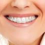 Опытный стоматолог и сапфировые брекеты